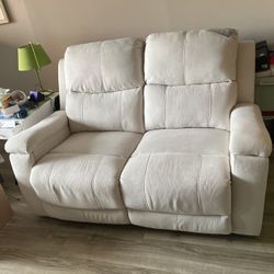 Reclining Love Seat With Cup Holders  . It Is Made Of Fabric And In Very Good Condition. Tags Still On And Less Than One Year Old. 