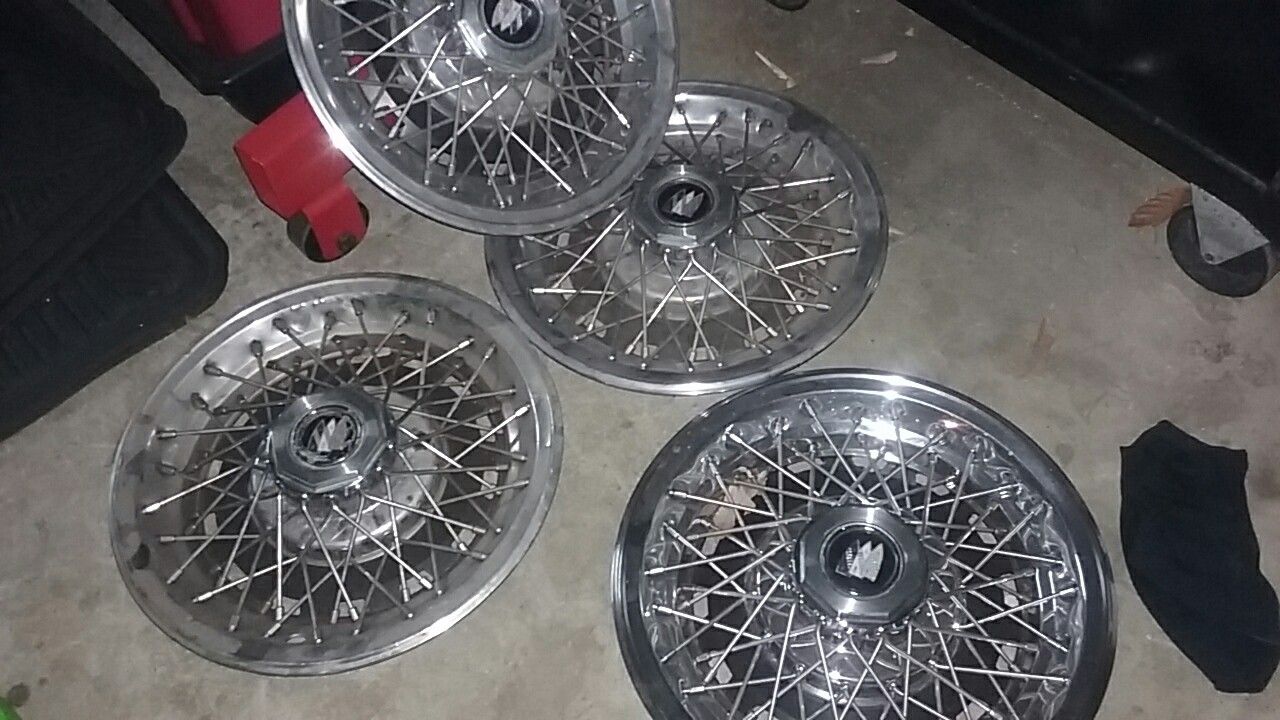 85 regal hubcaps 14"