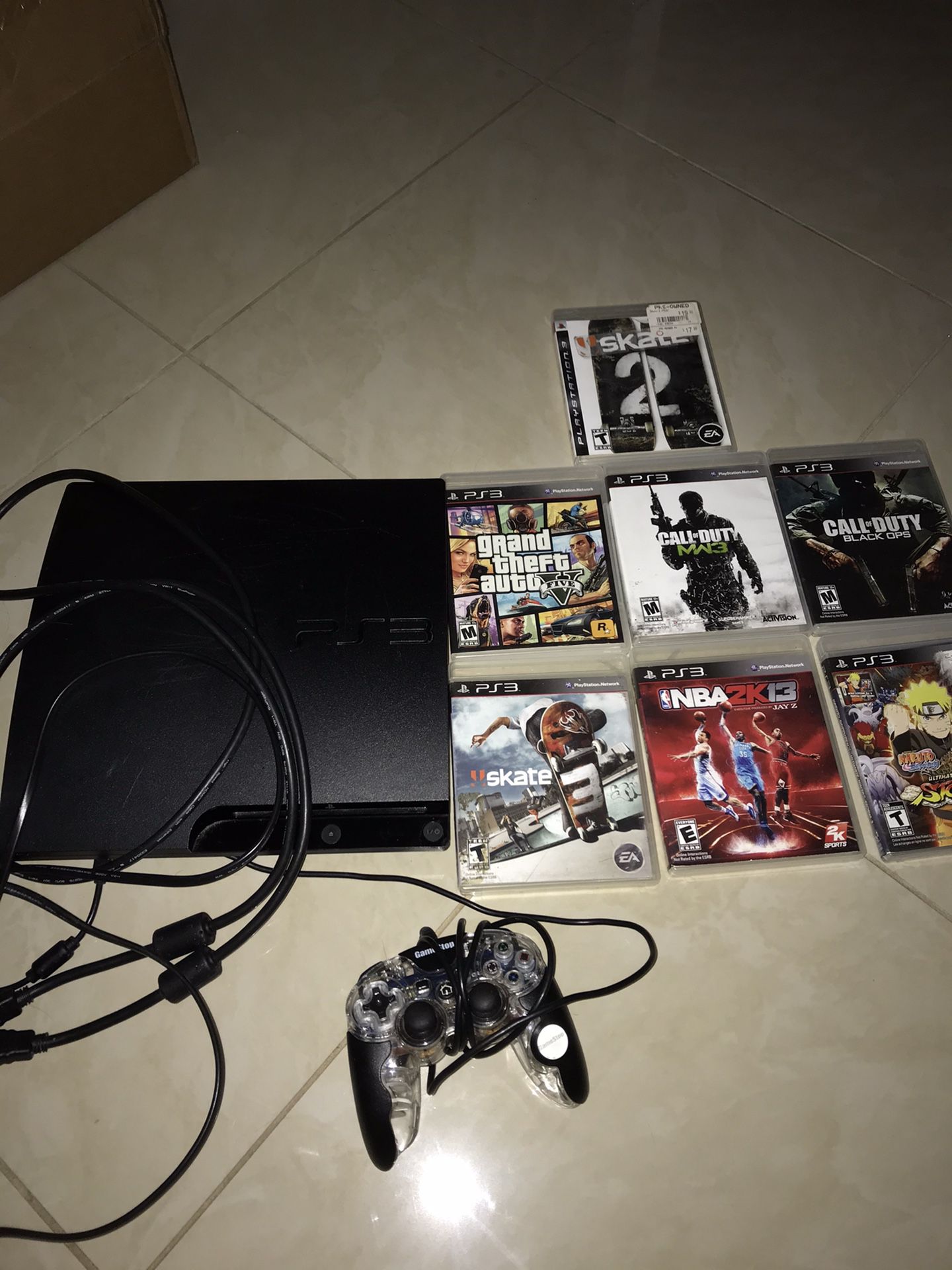 PS3 with controller, Cables, and games