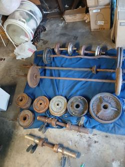 Assorted weights plate, dumbbell and bars