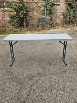 National Public Seating 60"' × 18" Folding Table, Gray