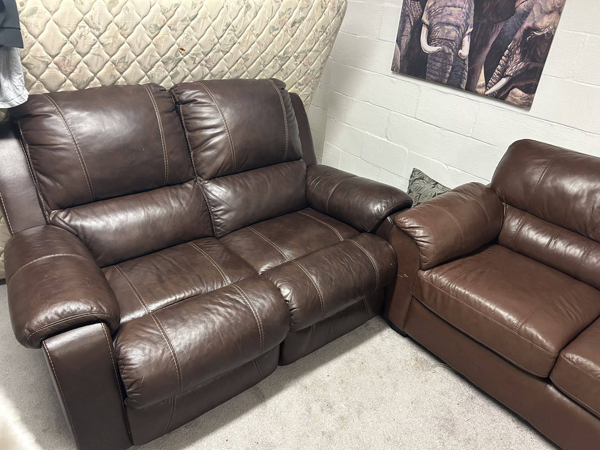 Leather loveseat with electric connections