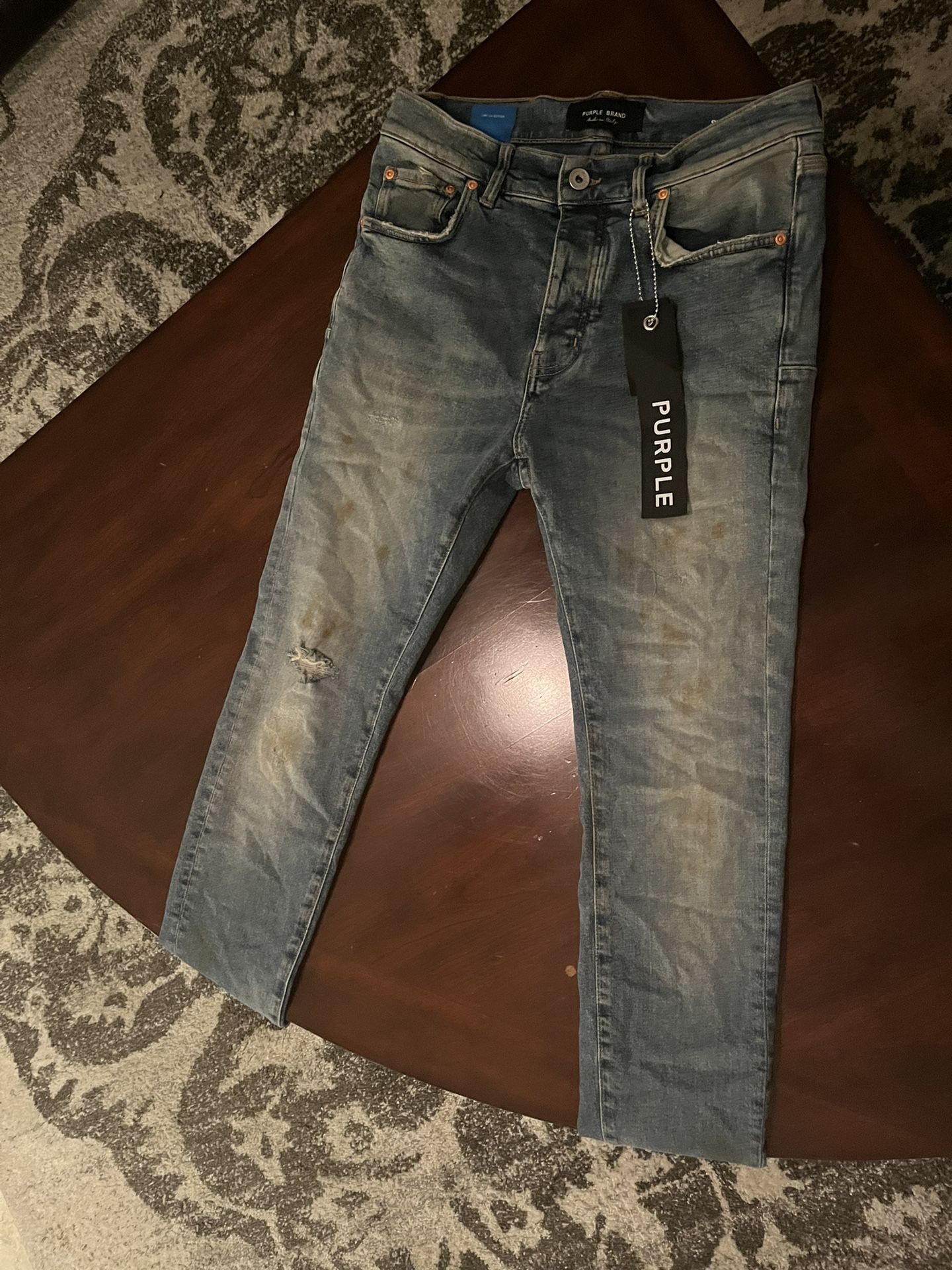 Black tag Purple jeans