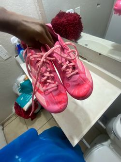 Pink adidas football Cleats