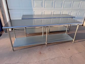Steel tables. 8’ft long.