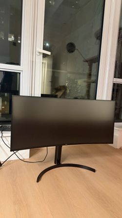 LG  34” display, curved ultrawide, 3440×1440 WQHD IPS, 60Hz, USB-C with 60W power delivery, height-adjustable stand.