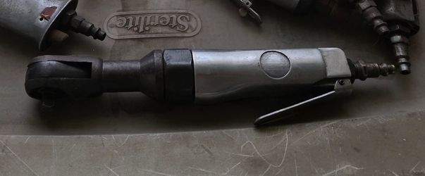 Mac Tools 3/8-inch drive pneumatic air ratchet wrench.