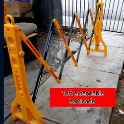Yellow scissors gate barricade with reflectiors