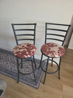 Cow print bar stools
