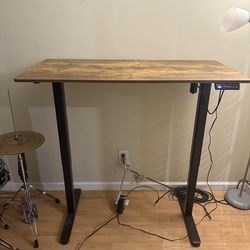 Electric adjustable stand up desk