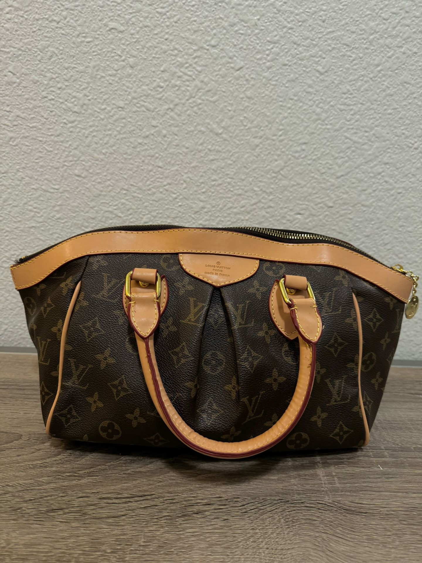 Louis Vuitton 2009 Pre-owned Monogram Tivoli PM Hand Bag- Brown