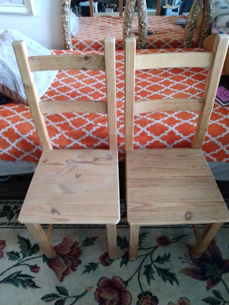 Two Solid Wood Chairs