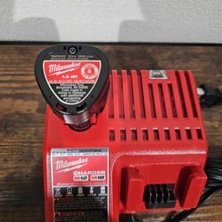 MILWAUKEE M18 M12 CHARGER  AND 1.5 BATTERY