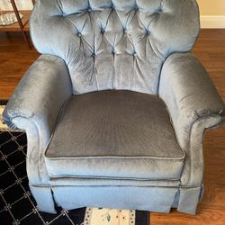 A Pair Of Matching Swivel Rocking Chairs