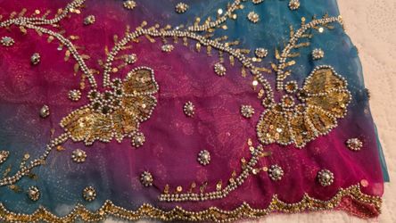 Indian saree or Kantha throw or Lep/Sujani Kantha) or a Phulkari shawl