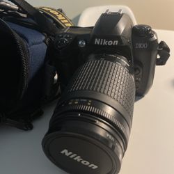 Nikon Camera And Lens