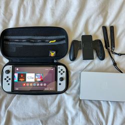 Nintendo Switch OLED w/ 11 paid games 