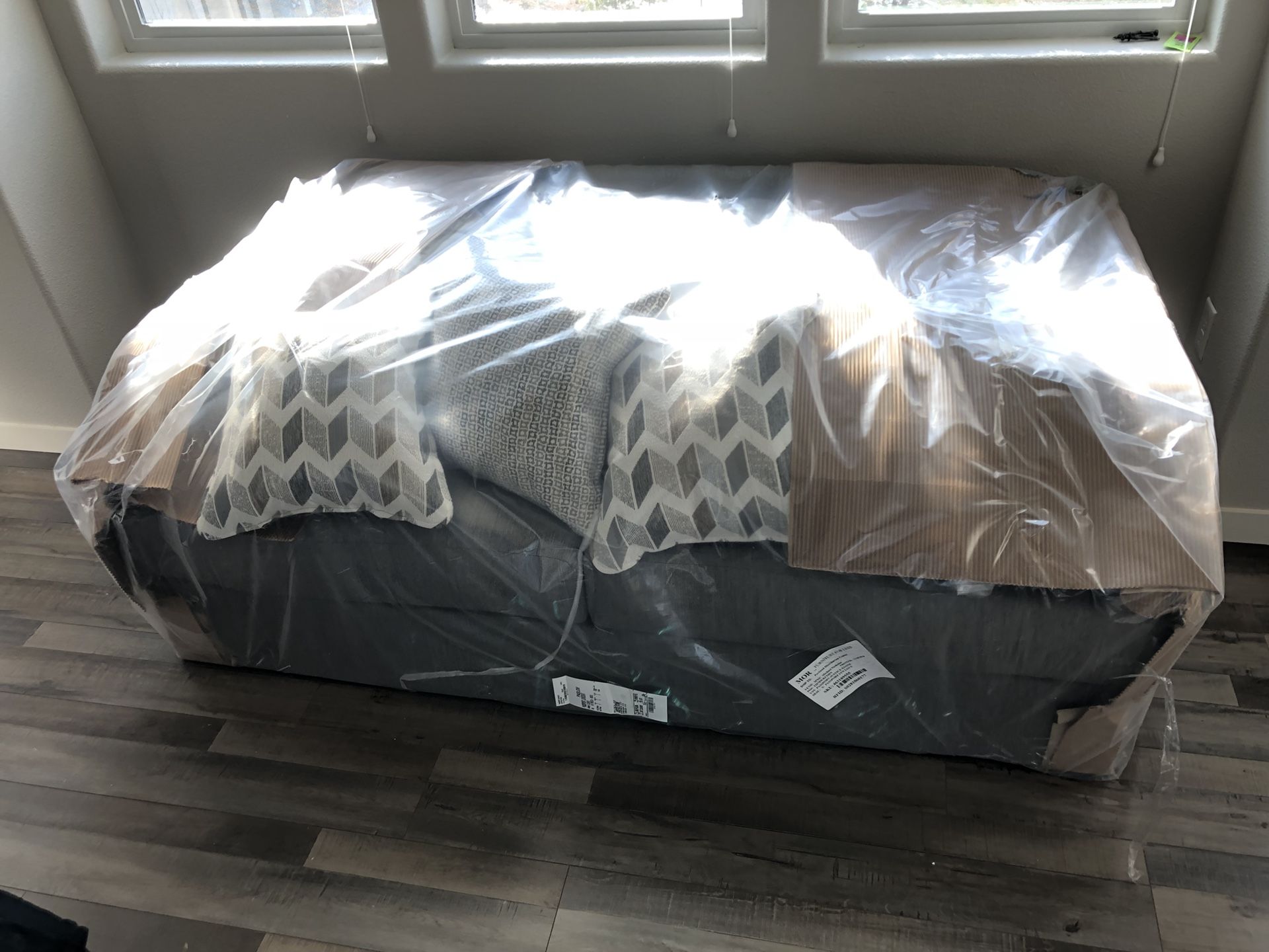 Loveseat brand new still wrapped