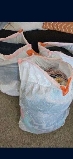 3 nags of woman Clothes summer dresses and more.  Items from 1 and 2 each