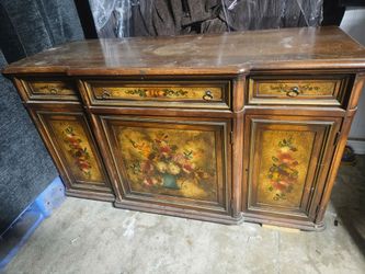 Antique buffet.
Hand painted front with original key $350.00