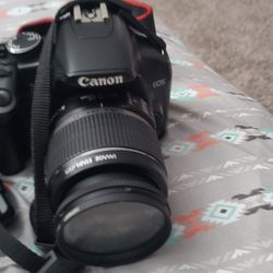 Canon eos rebel xsi .... come with charger