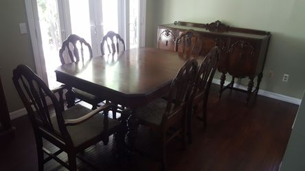 Antique dinner table w/ chairs & buffet