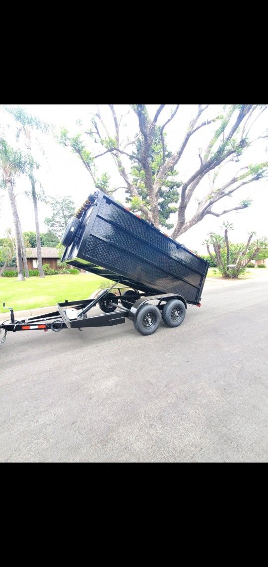 BRAND NEW DUMP TRAILER 8X12X4 12,000 LBS HYDRAULIC SYSTEM ROLLING TARP AND SPARE TIRE LED LIGHTS TITLE IN HAND READY FOR WORK FOR ANY QUESTION TEXT ME