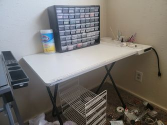Americrafters folding white sewing craft table with power outlets