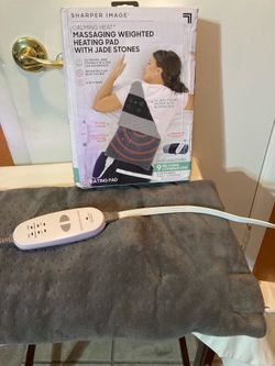 Sharper Image weighted vibration heating pad.