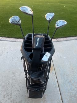Taylormade golf bag w/ callaway 3 7 & 9 woods & putter