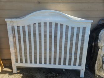 This is a white  headboard   beautiful