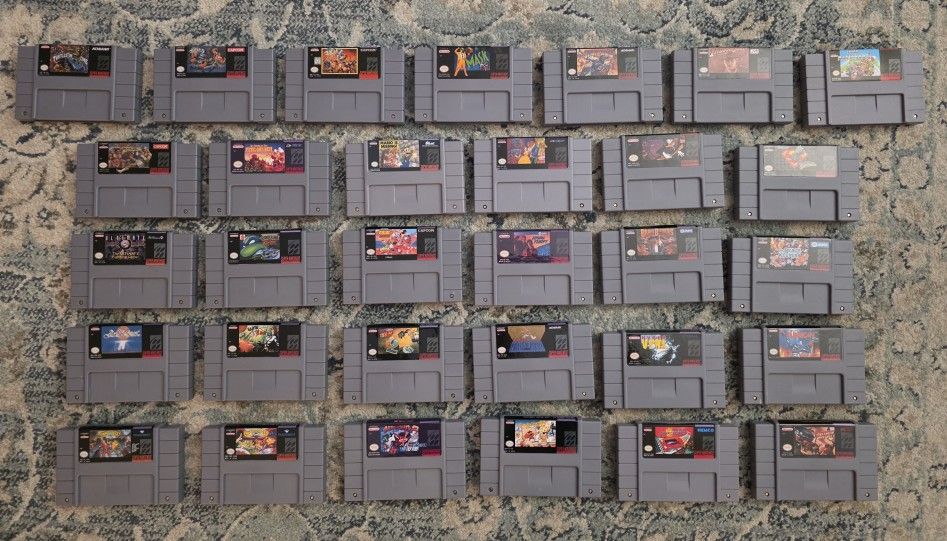 32 SNES Games. Super Nintendo. **READ**