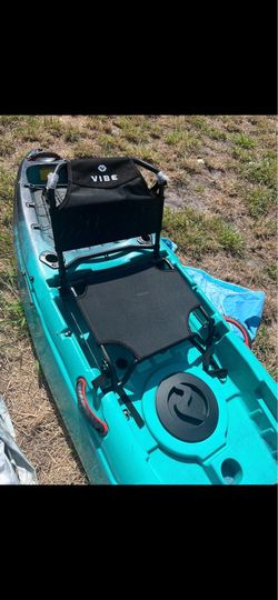 Kayak with paddle and tower
