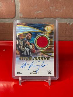 2025 Topps Universe WWE LA Knight Title Marks /99 Ring Worn Relic On Card Auto