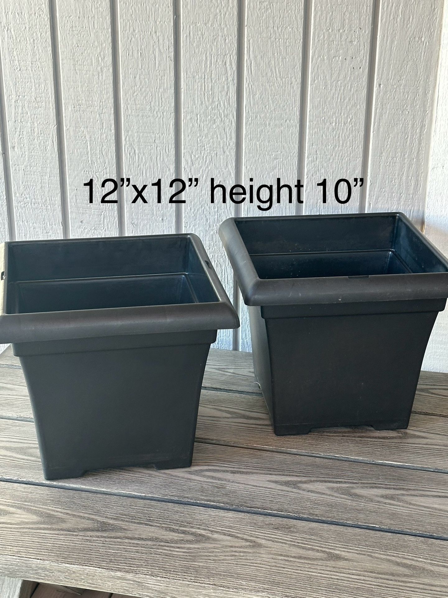 Two flowers planters $25 for both