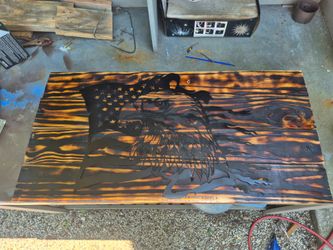 Eagle on bunt wood