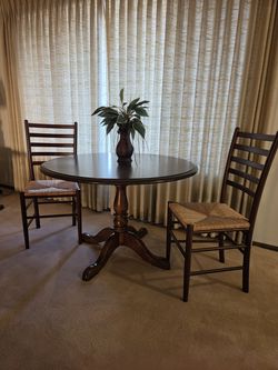 Early American style Ladderback dining chairs and Pedestal Table