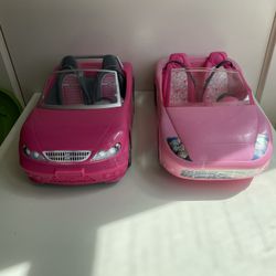 2 pink Barbie Convertibles