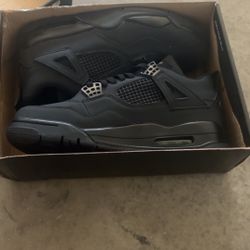 Black Cat Jordan 4s