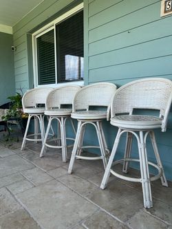 Four Raton Swivel barstools 24”T