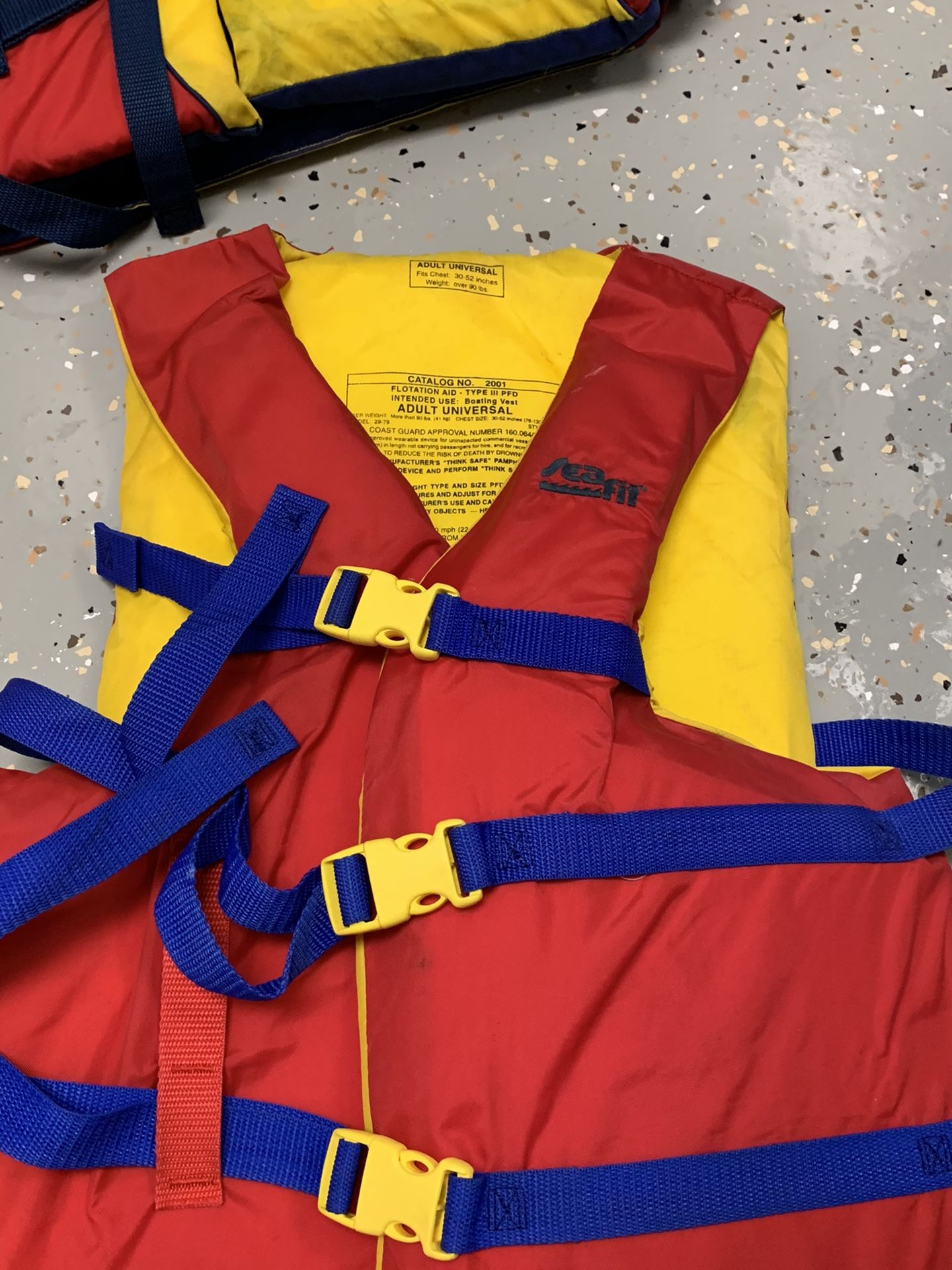 (5) Life Jackets And (1) Throwable. Stearns Coast Guard Approved