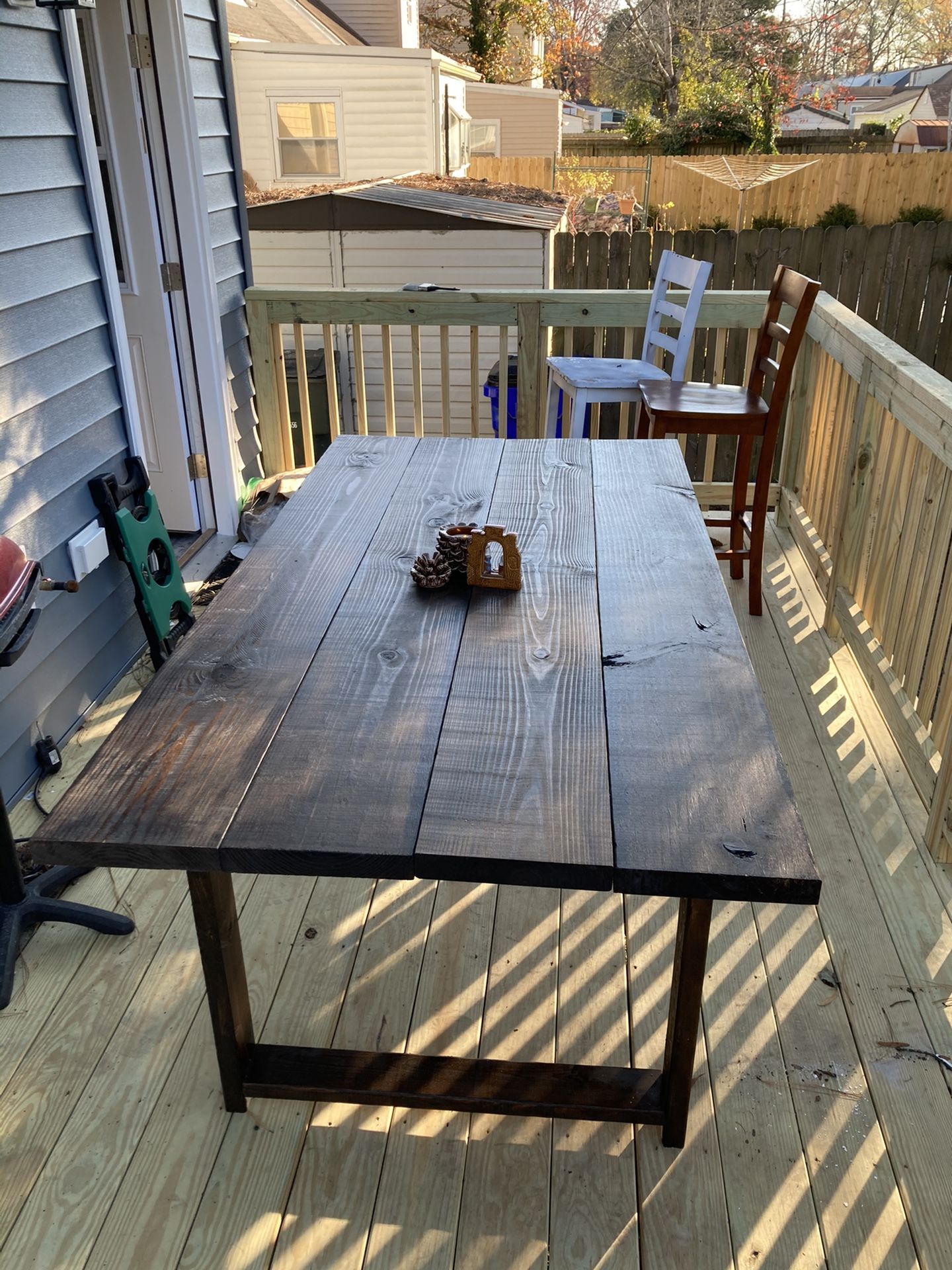 Inside/ outside weather treated wood table