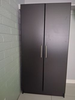 Black Two-Door Wardrobe with Two Cubby Slots included as shown in photo