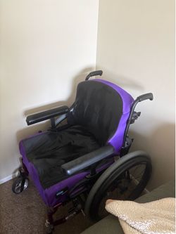 Purple and Black Invacare silhouette wheelchair normal size