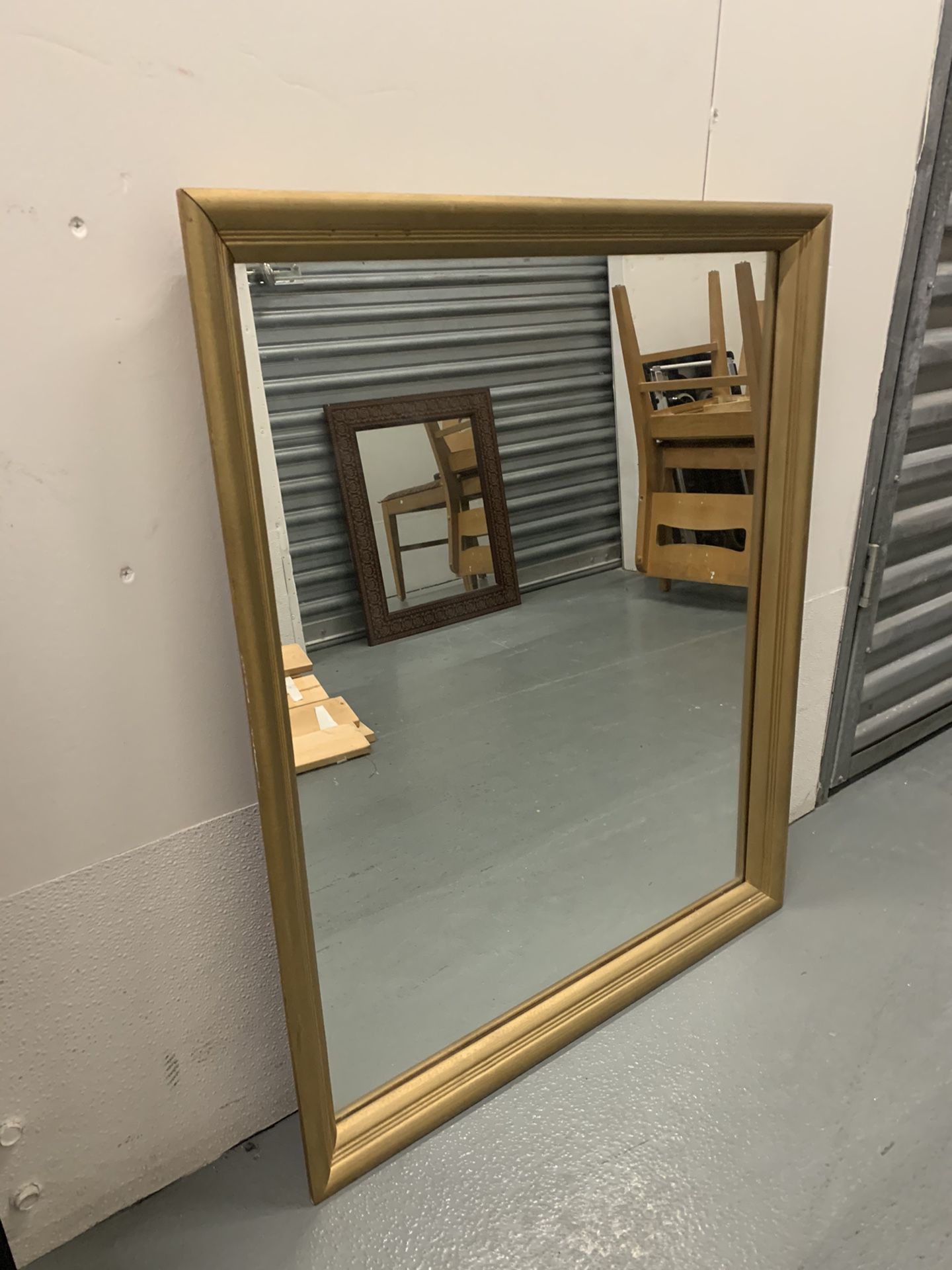 Gold frame wall mirror