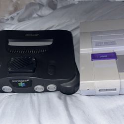 super Nintendo and n64, with games cords and controllers