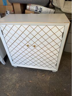 White and gold diamond pattern accent cabinet
