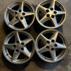 (4) Four Pontiac grand am GT 99-04 wheels. 