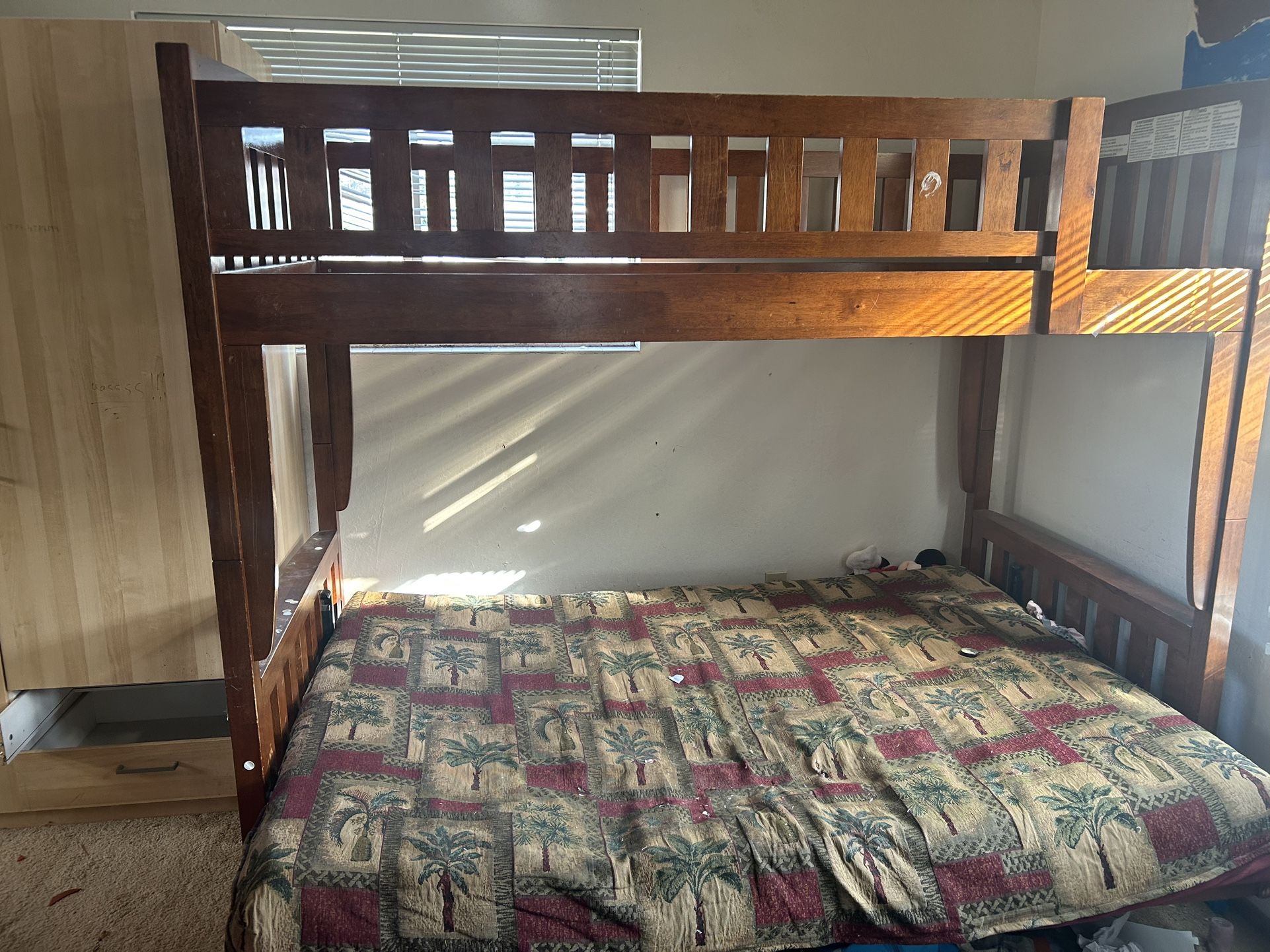 Bunk Bed Twin On Top, Full On Bottom Converts Into Futon Couch. With Futon Comes With Ladder To The Twin. 
