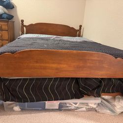 Full size solid wood Bed, mattress, box springs, mirror and dresser.  